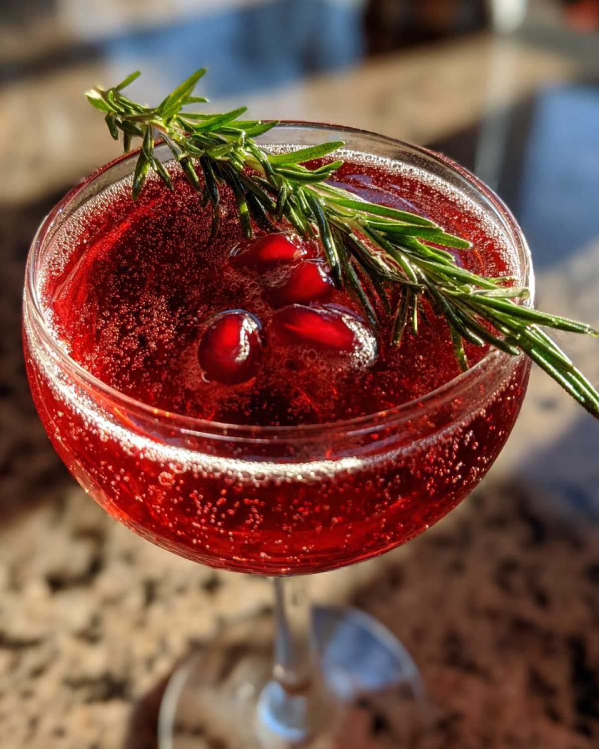 Pomegranate Rosemary Champagne Cocktail - detail 1