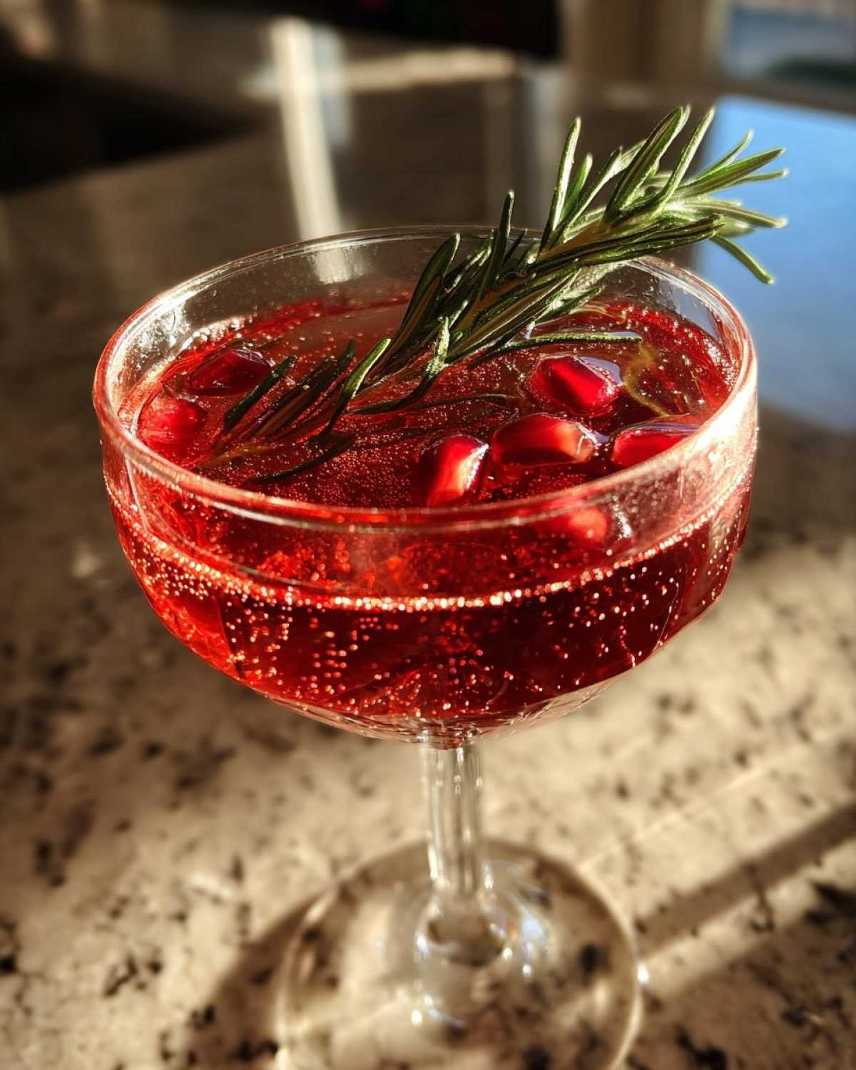 Pomegranate Rosemary Champagne Cocktail - detail 2