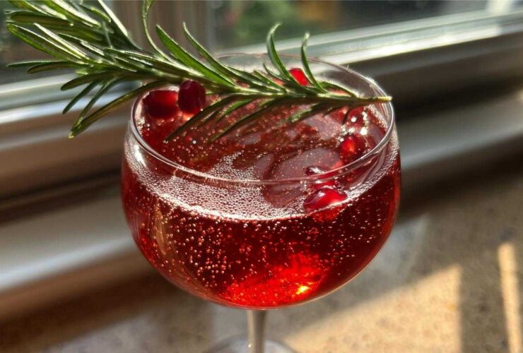 Pomegranate Rosemary Champagne Cocktail