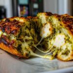Pesto Chicken Stuffed Garlic Bread
