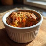 Close-up of a single serving of Gluten-Free Carrot Cake Baked Oats in a white ramekin.